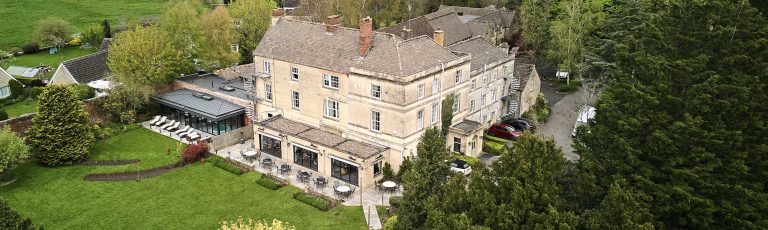 Aerial view of the grand Stratton House hotel in the Cotswolds