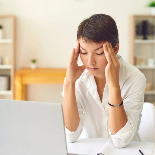 Hotel manager at computer