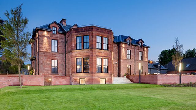 The front of the Douglas Hotel in Arran, in the evening light.